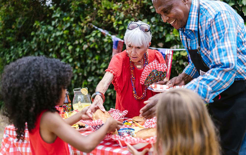 family enjoying picnic